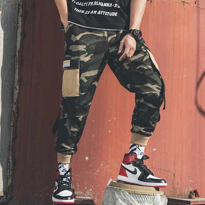 Men's loose casual overalls in green, cotton blend fabric with adjustable straps, front view