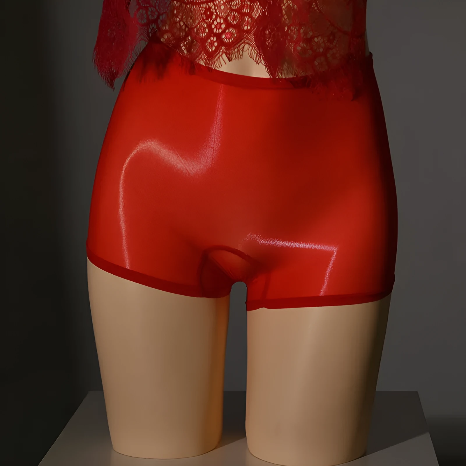 Men's shiny nylon underwear stockings showing mid waist design and seamless construction in multiple colour options