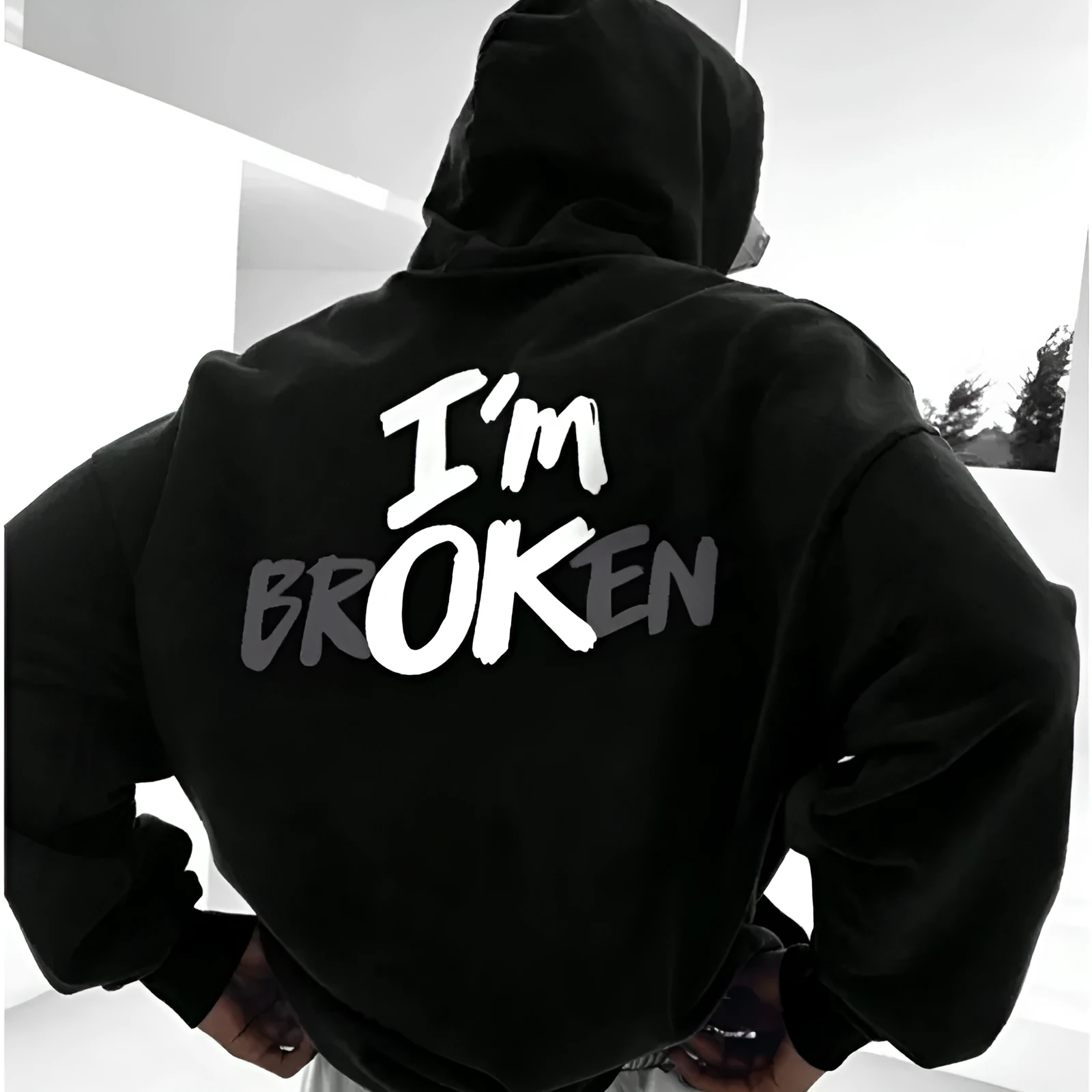 Men's black pullover hoodie with 3D stereo print pattern on front, long sleeves, spandex fabric