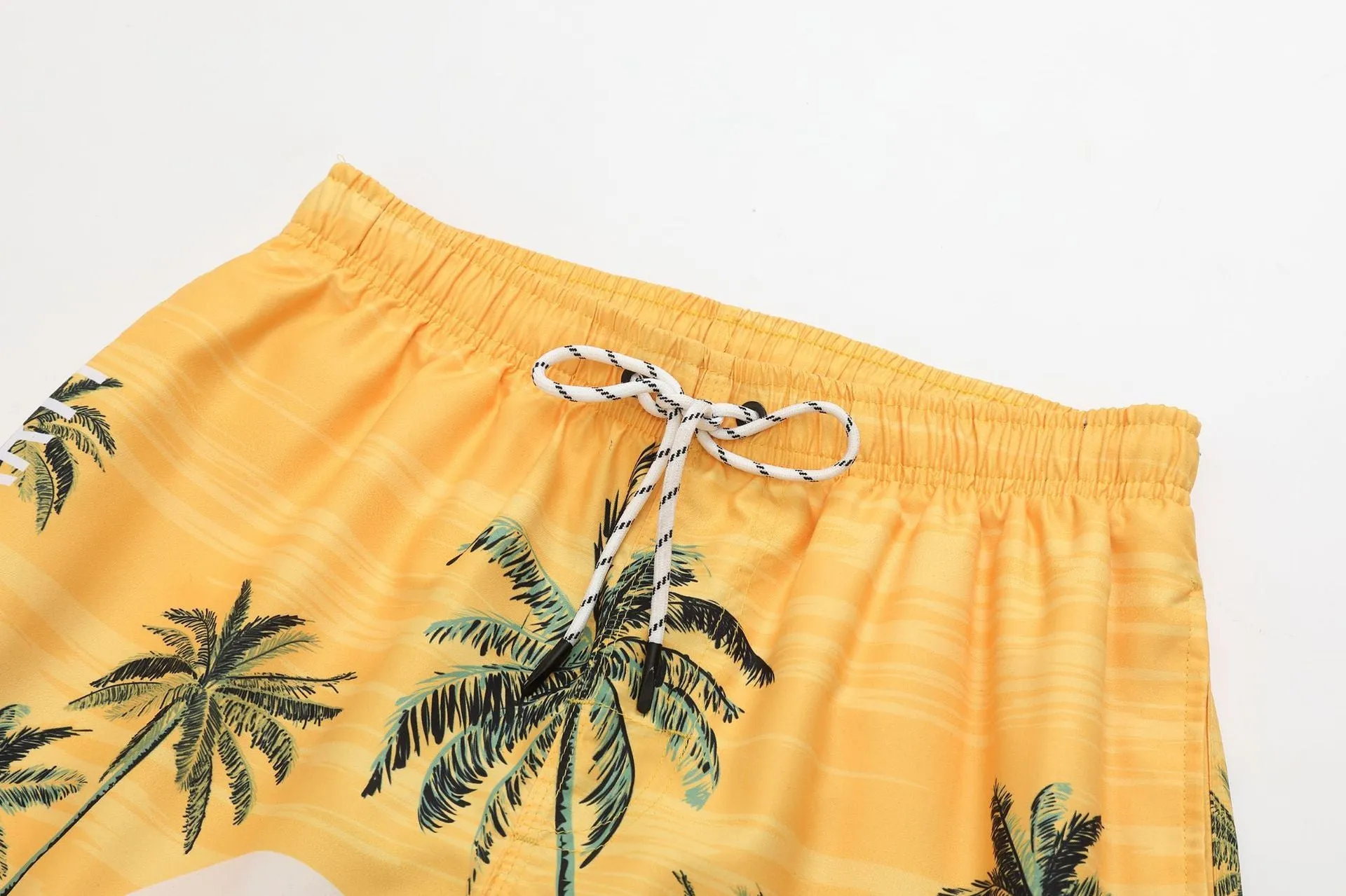 Coconut pattern polyester beach shorts for men and women in picture colour STK220201