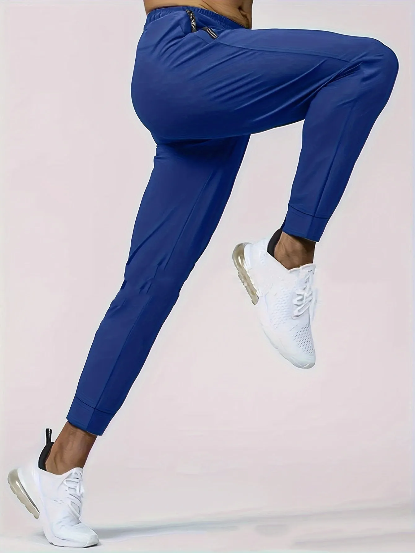 Men's jogging sports pants in nylon blend, mid waist loose fit, available in black gray khaki blue sizes L to 7XL