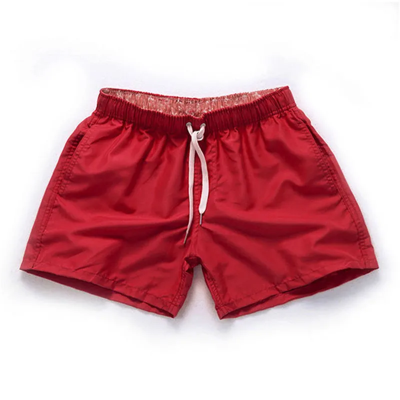 Men's straight leg beach shorts in multiple colours including fluorescent yellow for surfing