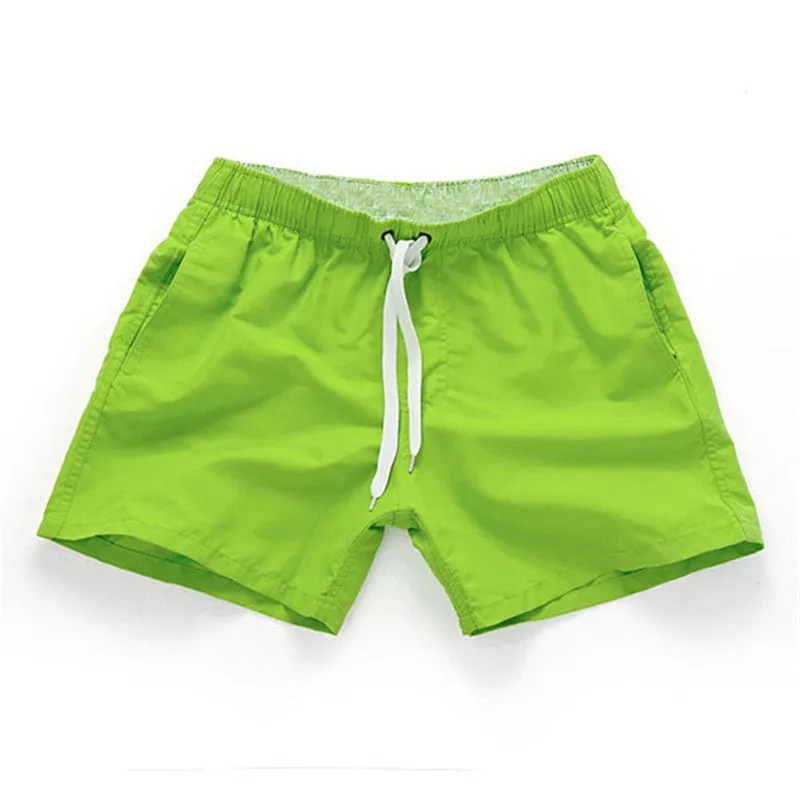Men's straight leg beach shorts in multiple colours including fluorescent yellow for surfing