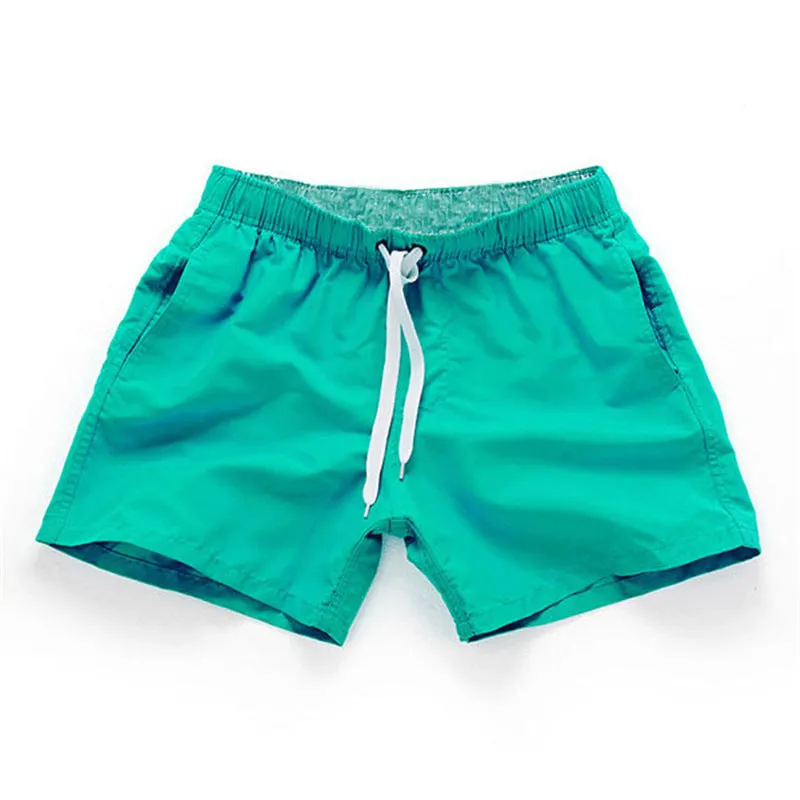 Men's straight leg beach shorts in multiple colours including fluorescent yellow for surfing