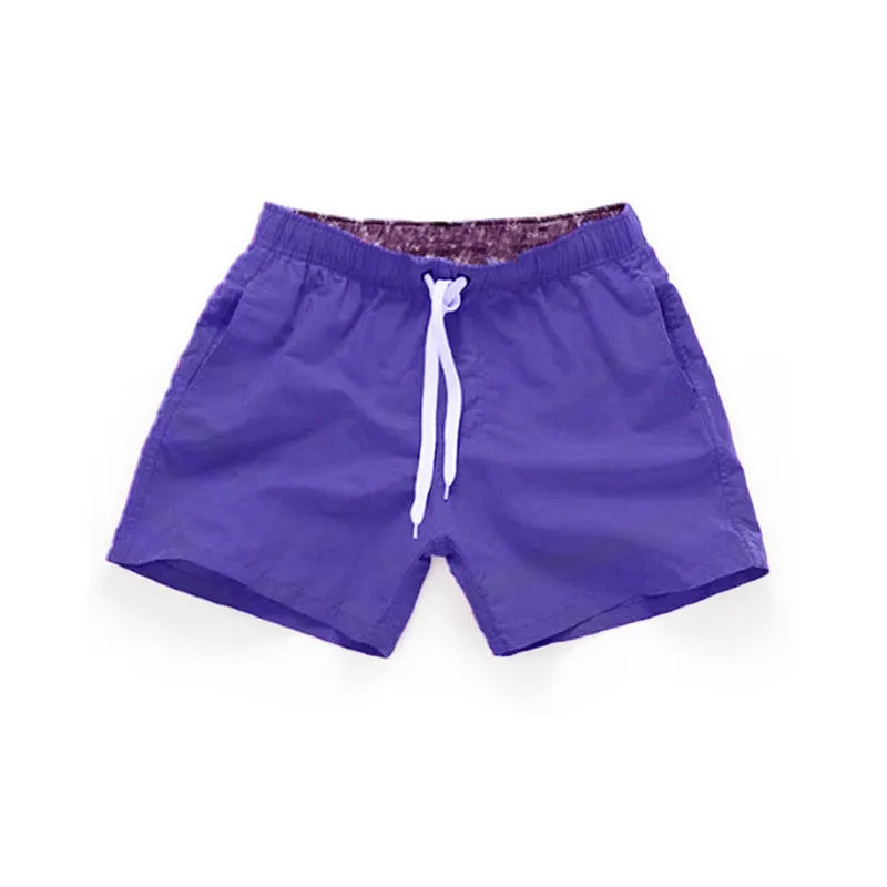 Men's straight leg beach shorts in multiple colours including fluorescent yellow for surfing