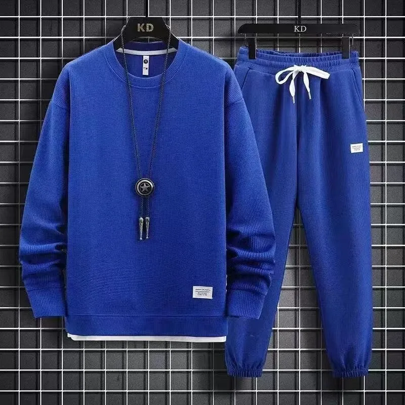 Men's wool-blend long sleeve tracksuit set in dark grey, front view, on model