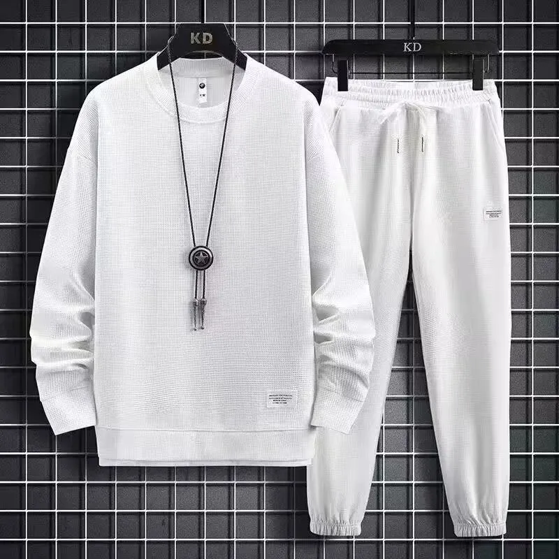 Men's wool-blend long sleeve tracksuit set in dark grey, front view, on model