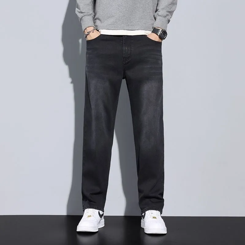 Men's straight leg casual jeans in black cotton denim with non-iron finish, side view.