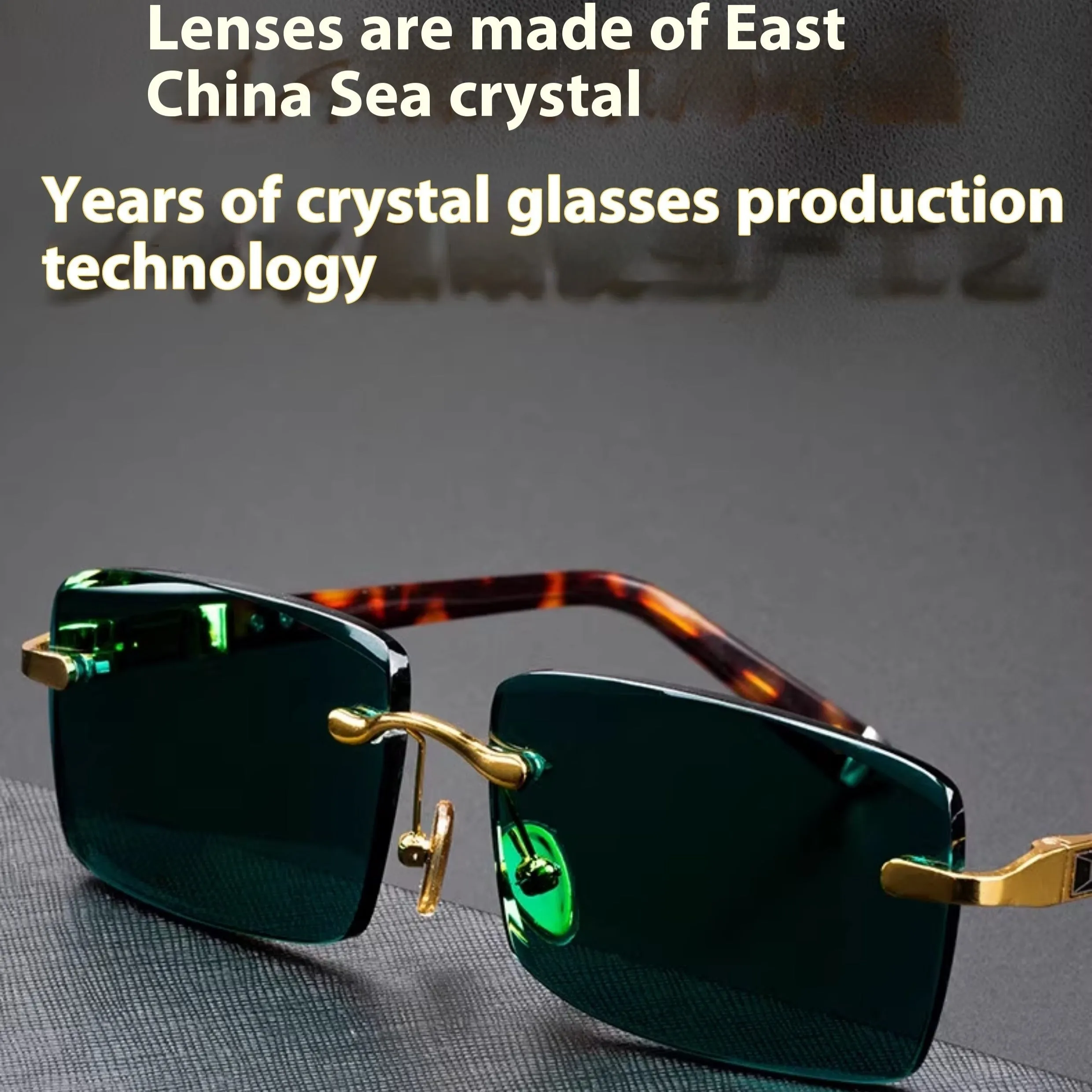 Frameless dark green crystal sunglasses with a glasses case and cleaning cloth.