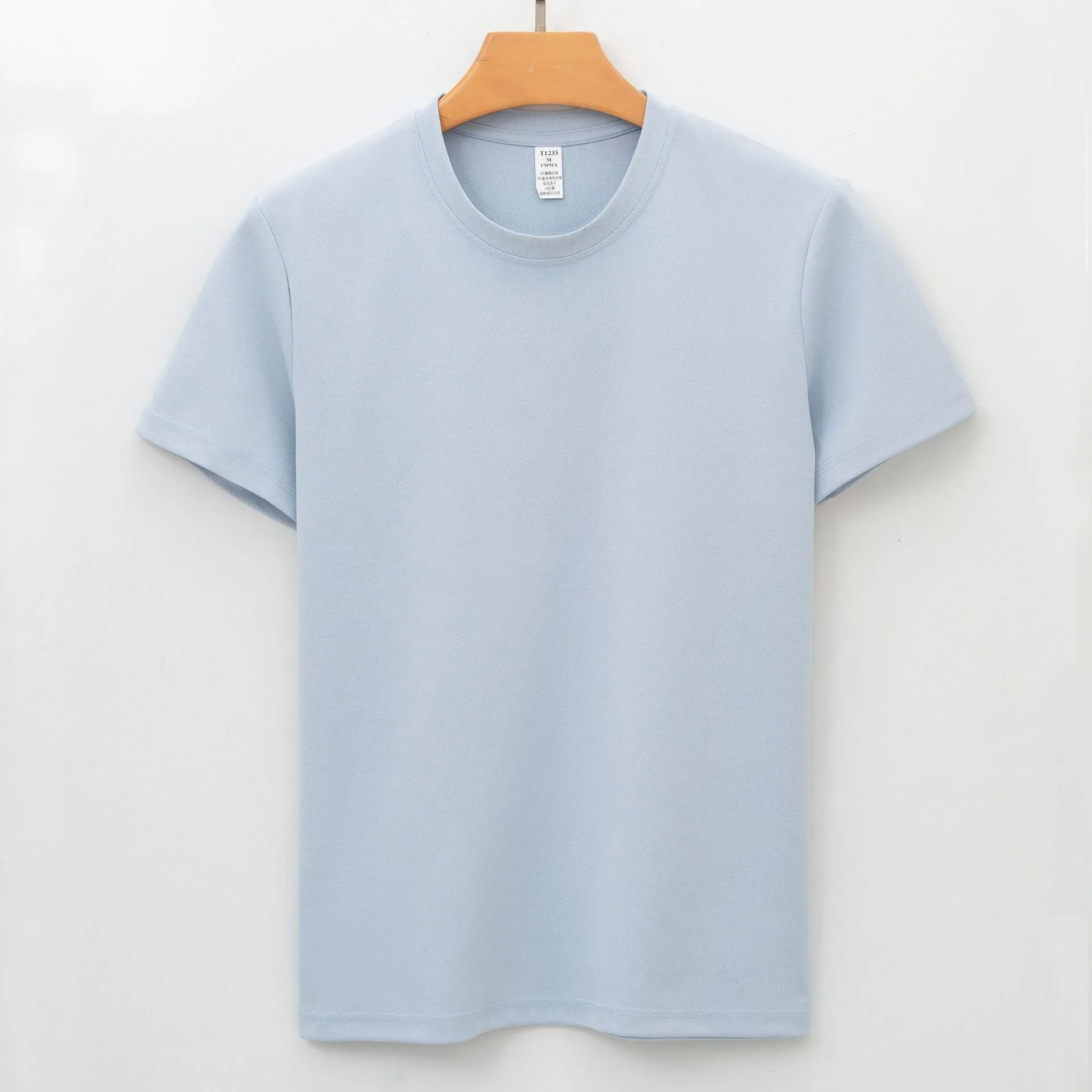 Men's solid colour short-sleeve antibacterial quick-dry T-shirt on a hanger.