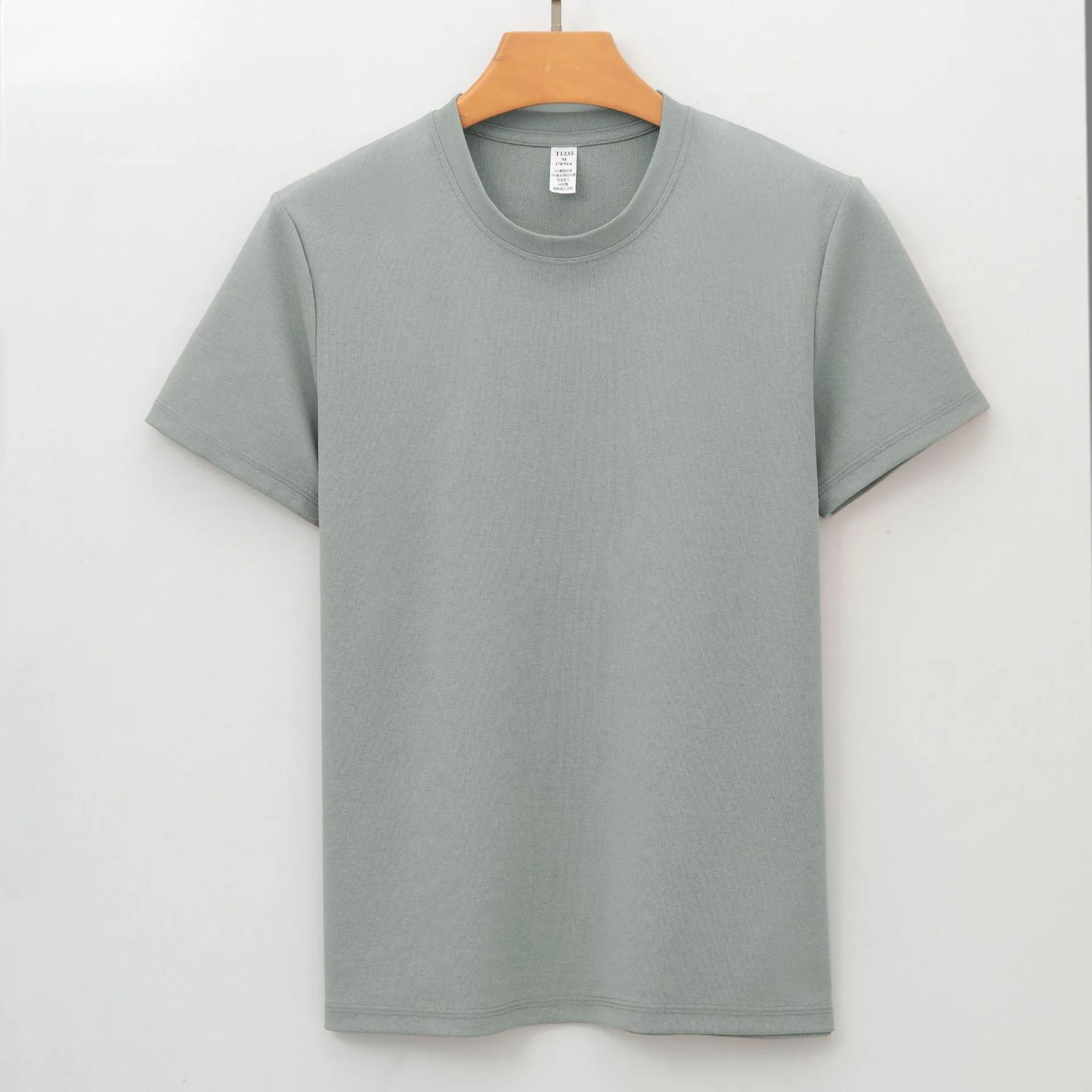 Men's solid colour short-sleeve antibacterial quick-dry T-shirt on a hanger.