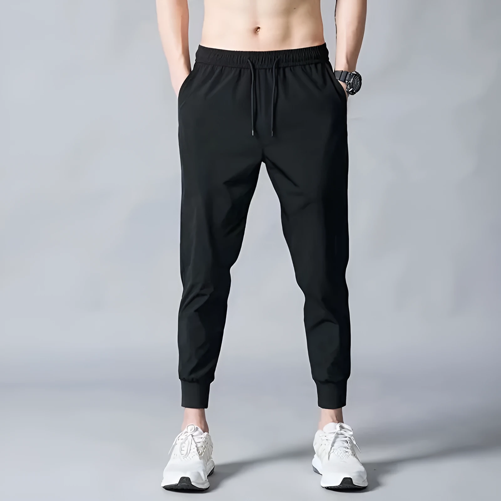Men's thin ice silk loose fit trousers in black polyester fabric, front view, size M to 5XL