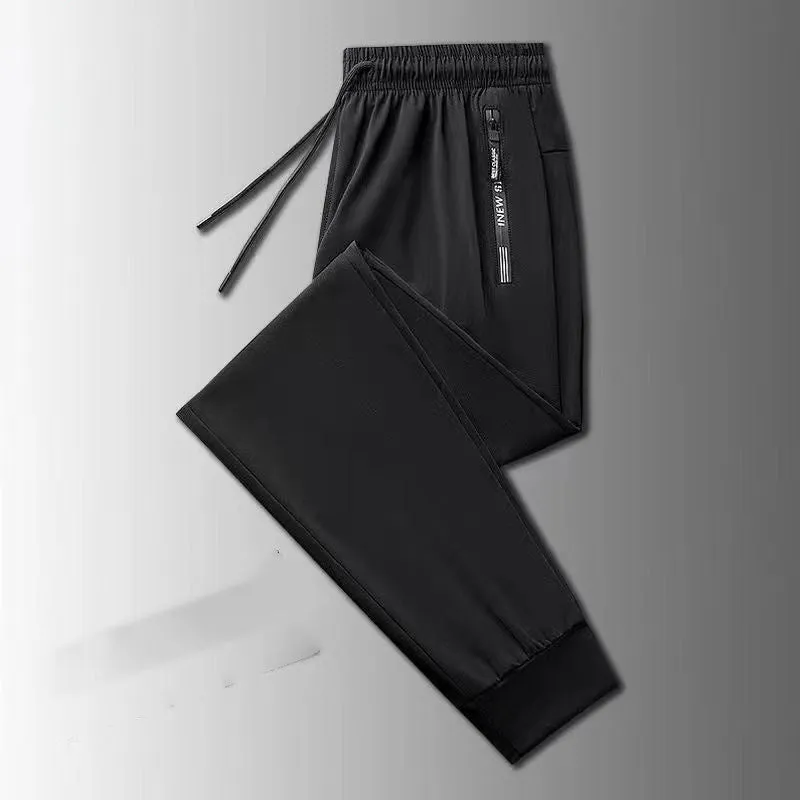 Men's thin ice silk loose fit trousers in black polyester fabric, front view, size M to 5XL