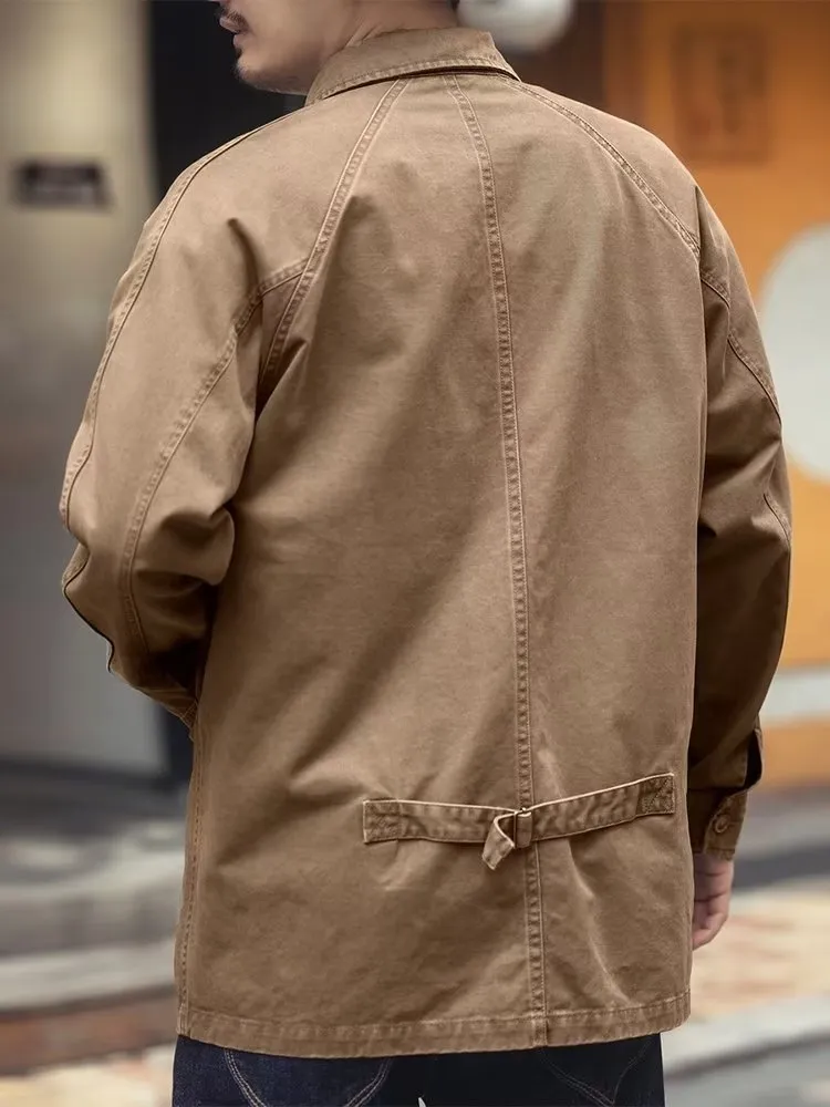 Men's khaki cotton blend denim jacket with loose fit and multiple pockets on a plain background