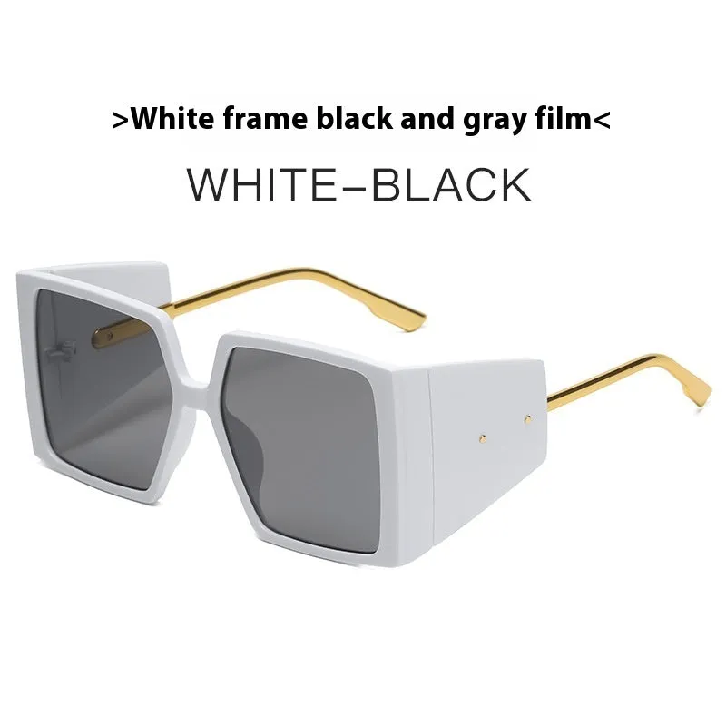 Large square frame sunglasses with UV400 lenses in seven colour options on a wooden surface.