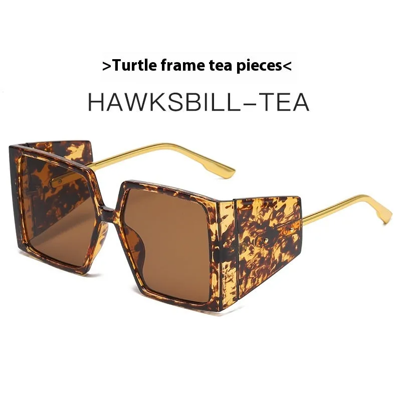 Large square frame sunglasses with UV400 lenses in seven colour options on a wooden surface.