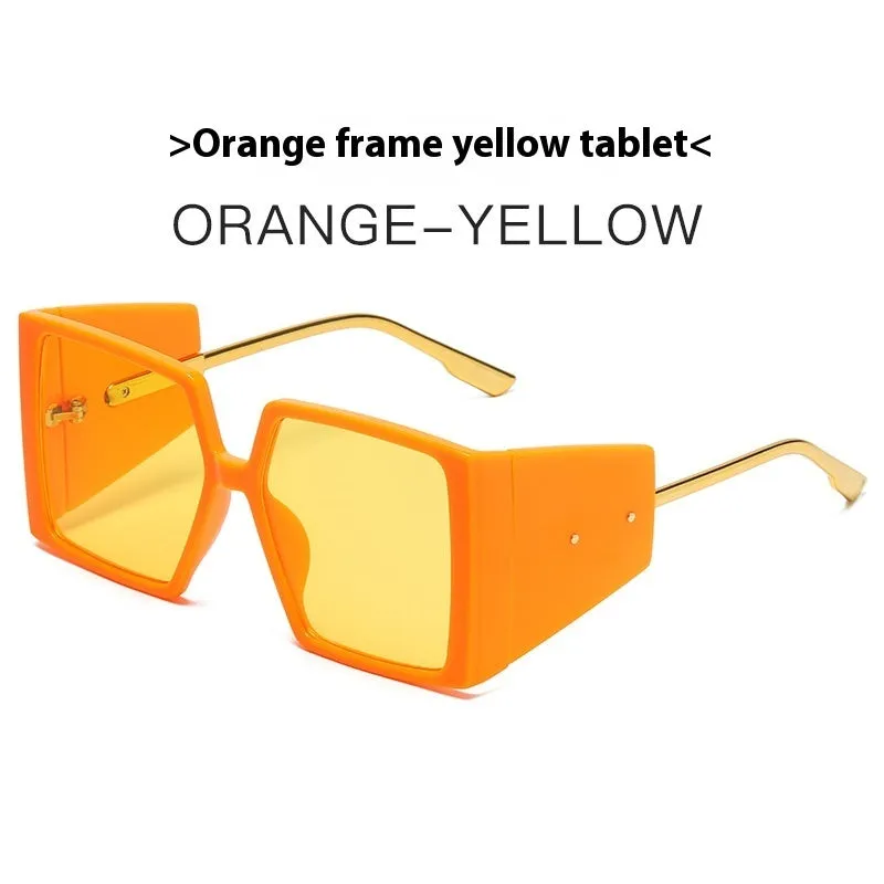 Large square frame sunglasses with UV400 lenses in seven colour options on a wooden surface.