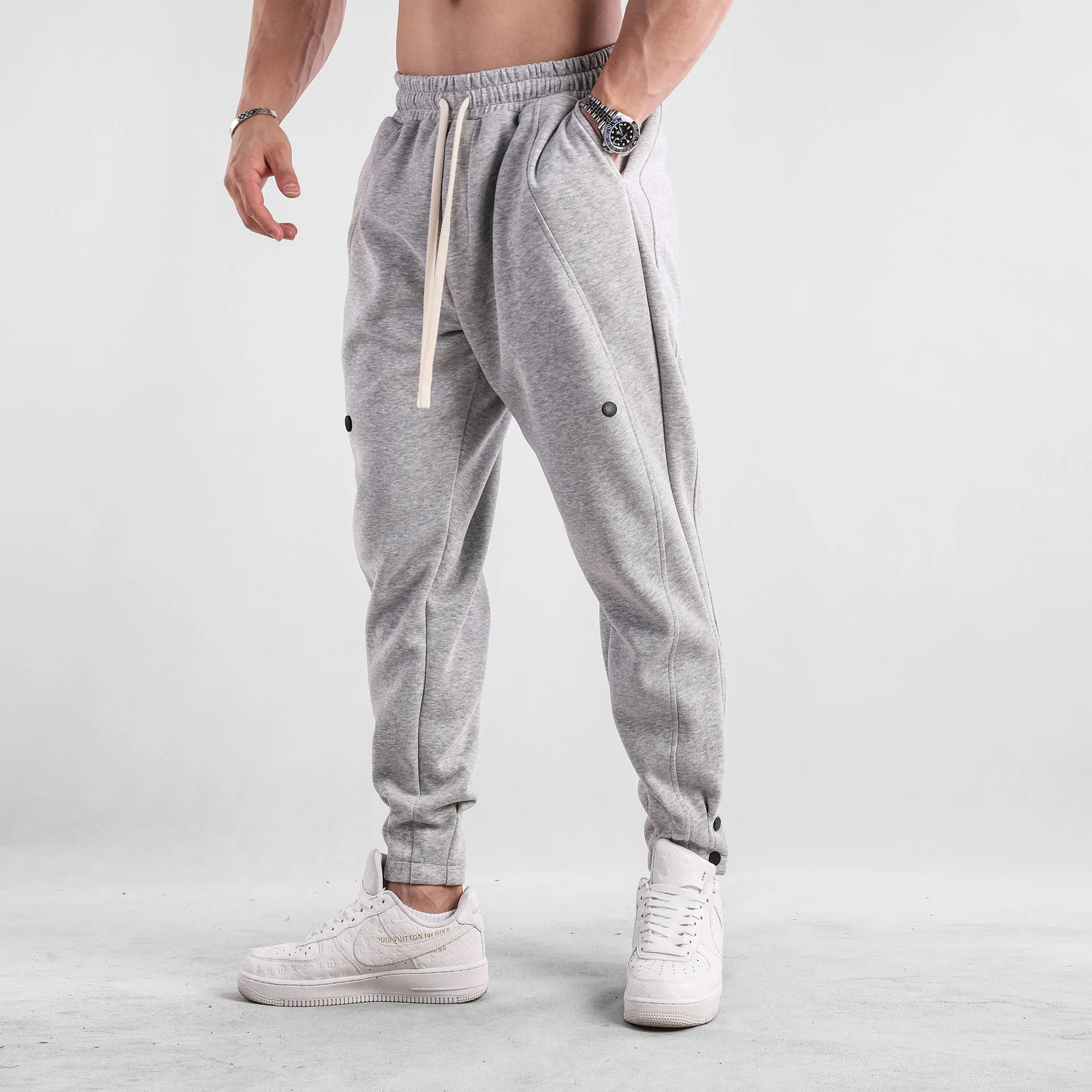Men's loose-fit cotton casual trousers in light blue, mid-waist design, available in sizes M to XXXL