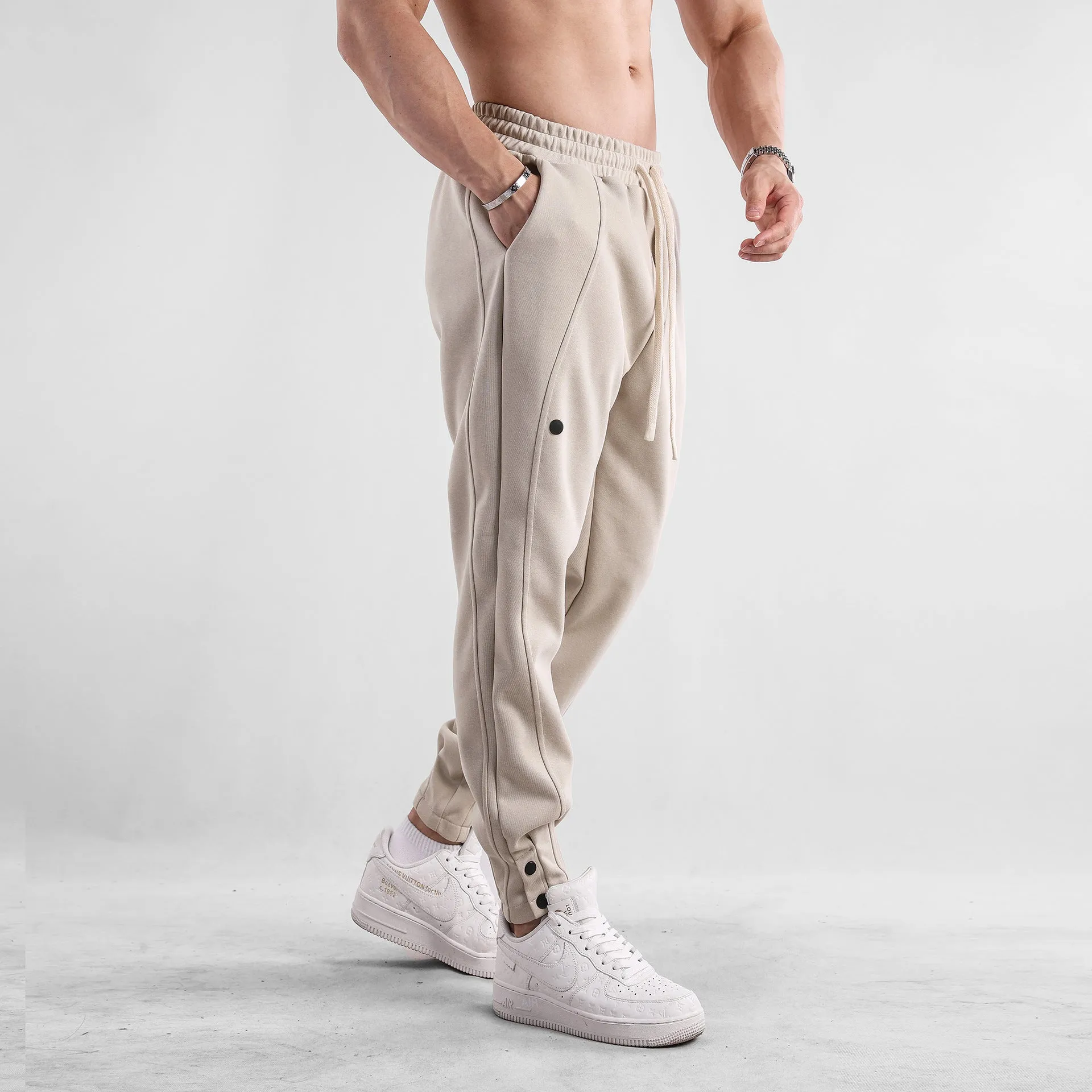 Men's loose-fit cotton casual trousers in light blue, mid-waist design, available in sizes M to XXXL