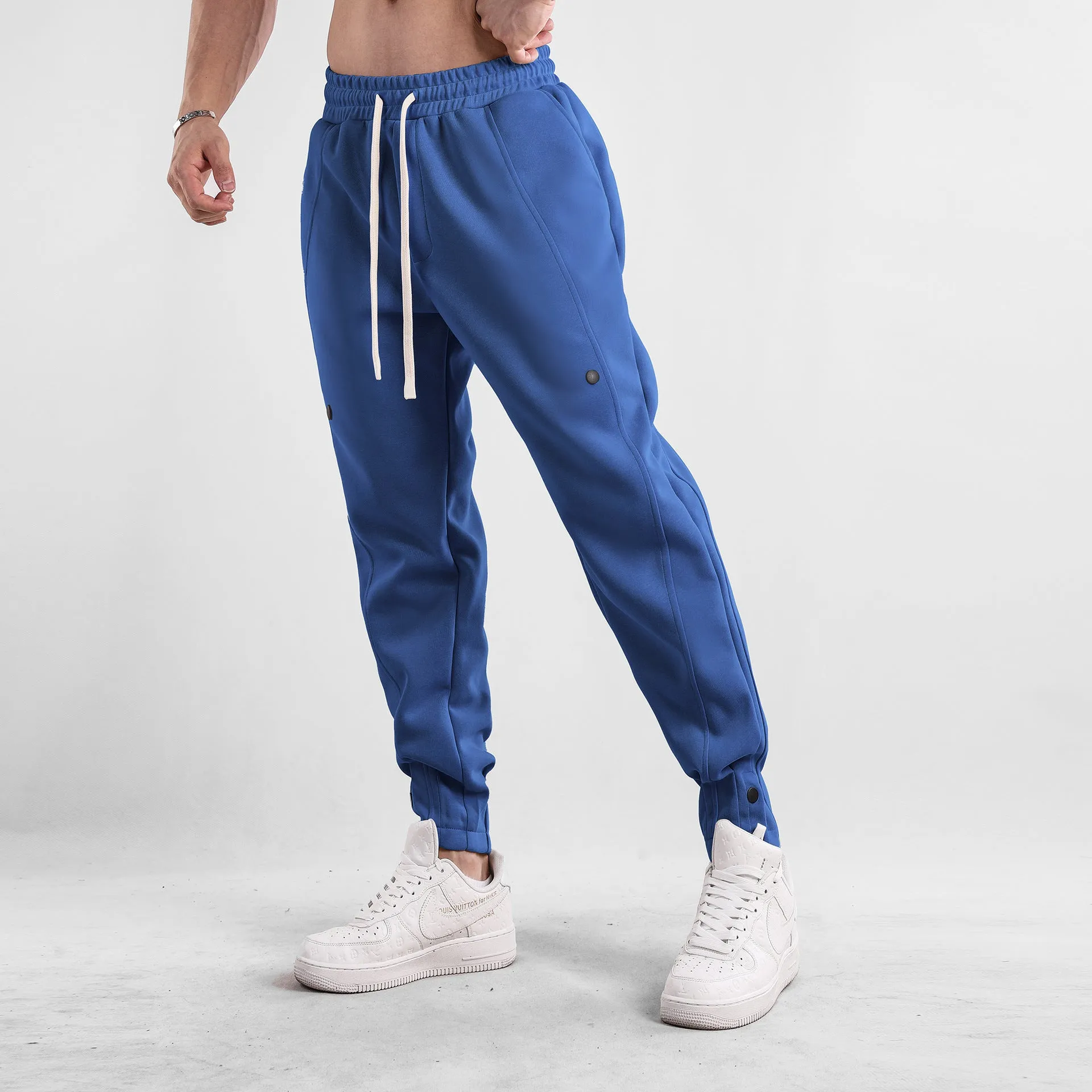 Men's loose-fit cotton casual trousers in light blue, mid-waist design, available in sizes M to XXXL