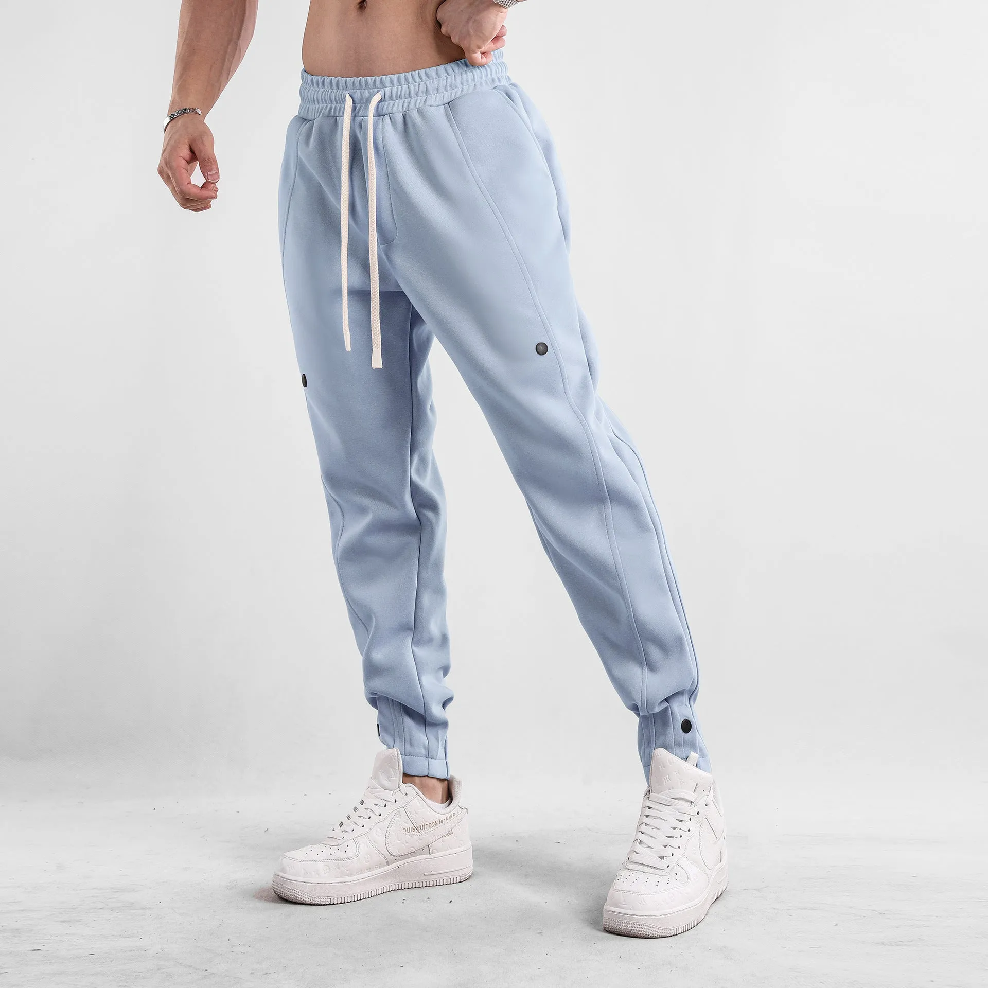 Men's loose-fit cotton casual trousers in light blue, mid-waist design, available in sizes M to XXXL