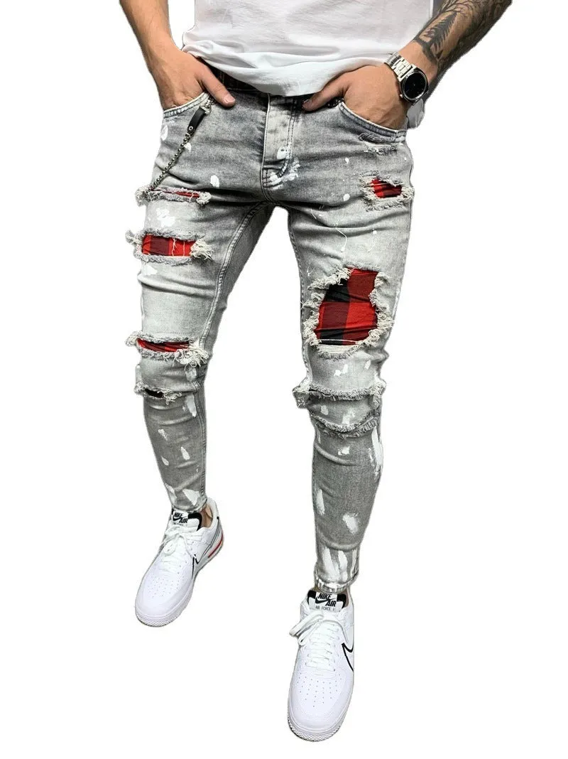 Men's ripped patch slim-fit jeans in gray with hand-painted details and zipper fly on white background