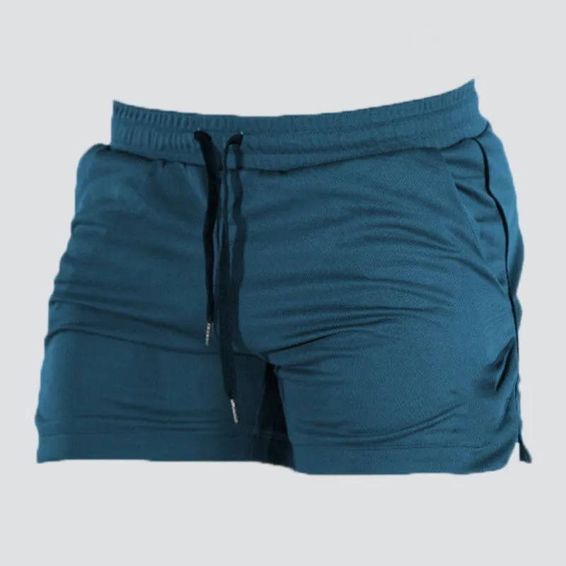 Men's stretch polyester swimsuit in slim fit, available in multiple colours for sports and leisure