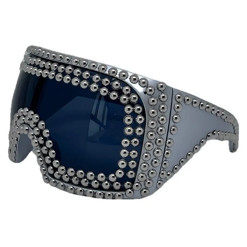 Men's punk style sunglasses with a large square frame and silver rivet details
