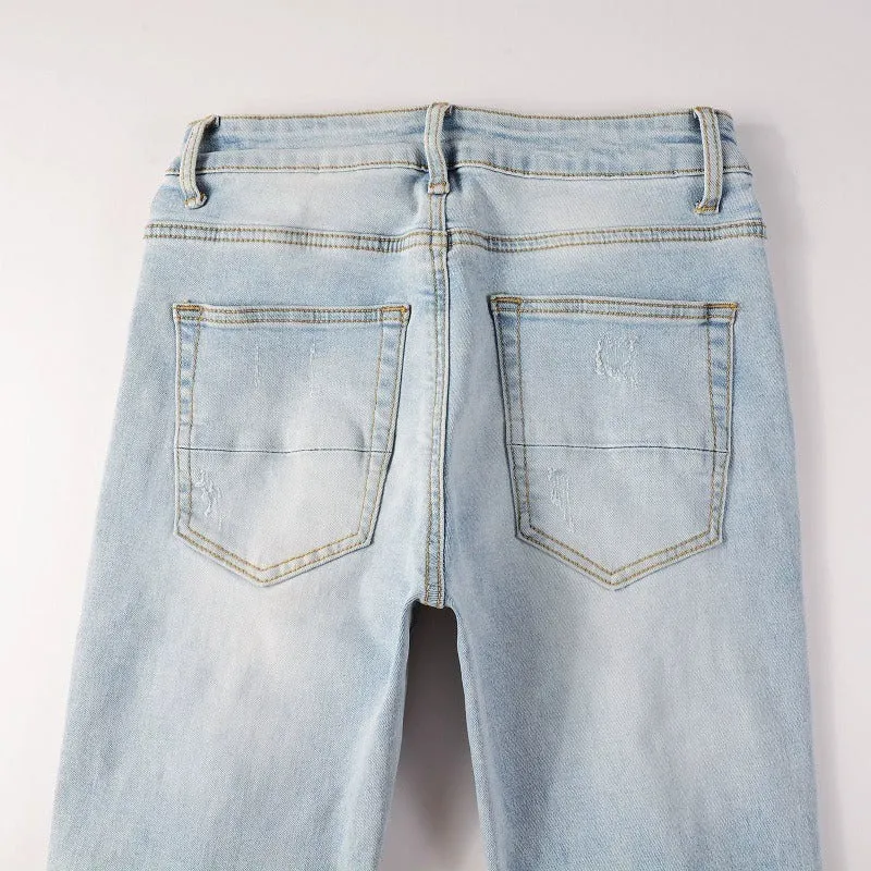 Light blue slim fit stretch jeans for men with hot diamond patch and cat-whisker details