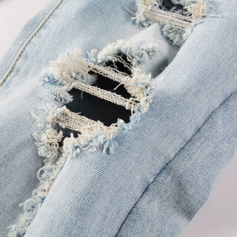 Light blue slim fit stretch jeans for men with hot diamond patch and cat-whisker details