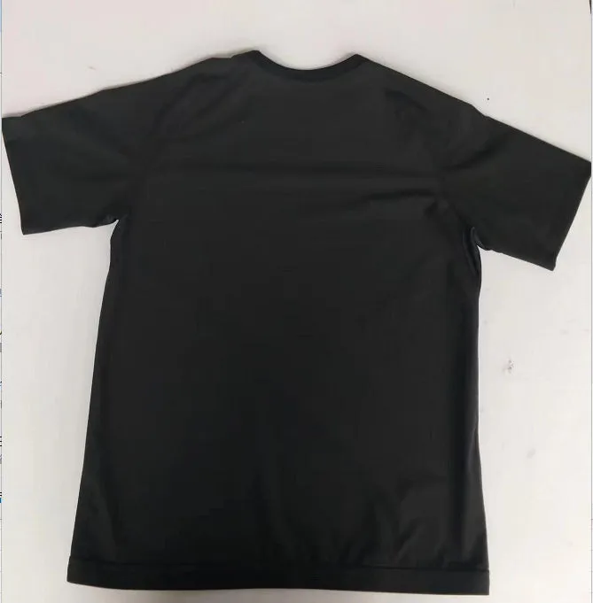 Men's short sleeve black polyester body shaping fitness tank top on a plain background