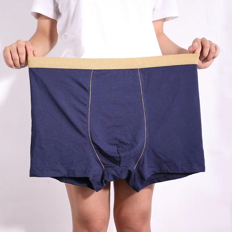 Men's oversized cotton baggy boxers in black, red, gray, blue and purple on a white background