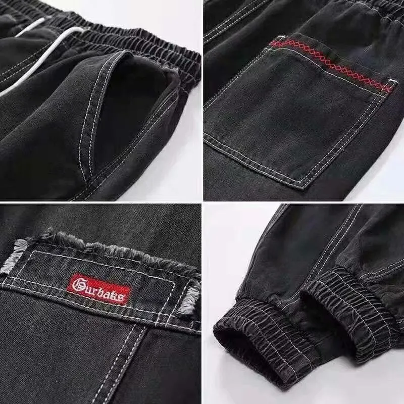 Plus size men's wide leg harem denim trousers with tie waist, available in black and light blue, sizes S to 5XL