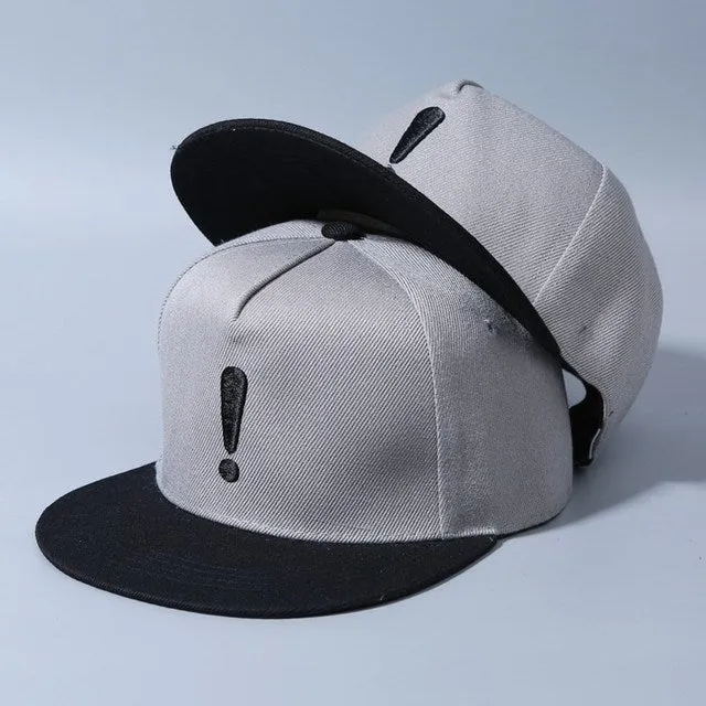 Cotton baseball cap with embroidered exclamation mark, adjustable dome crown, in black