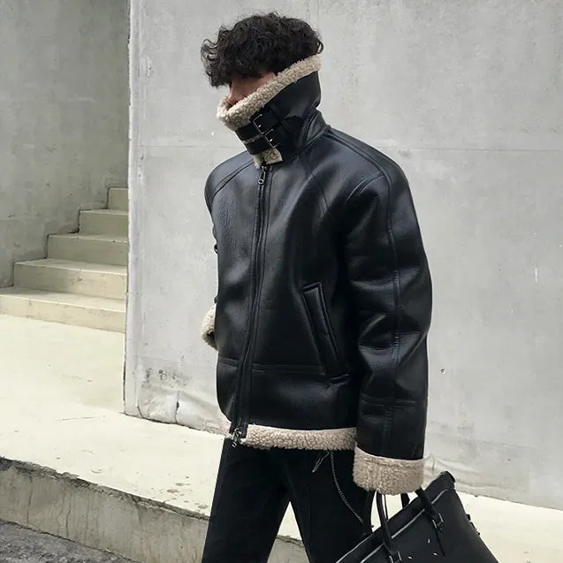 Men's black PU leather jacket with padded collar, front zip, and long sleeves on a model