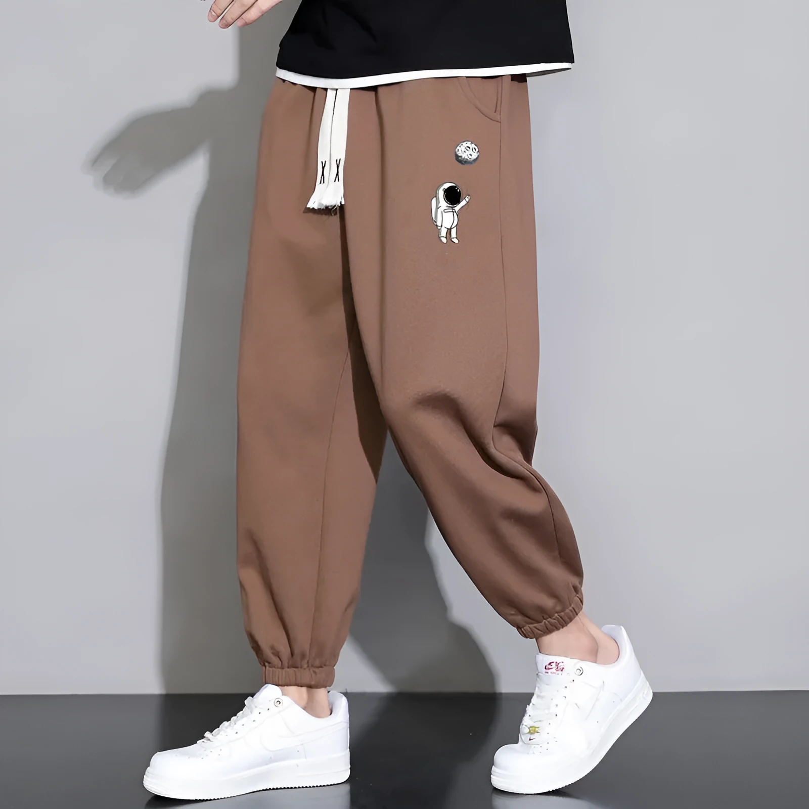 Men's cropped casual loose tapered pants in black, 100% polyester, mid waist, cropped length, sizes M to 4XL.