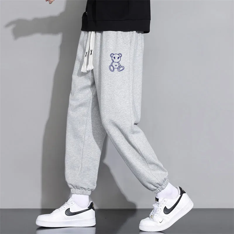 Men's cropped casual loose tapered pants in black, 100% polyester, mid waist, cropped length, sizes M to 4XL.