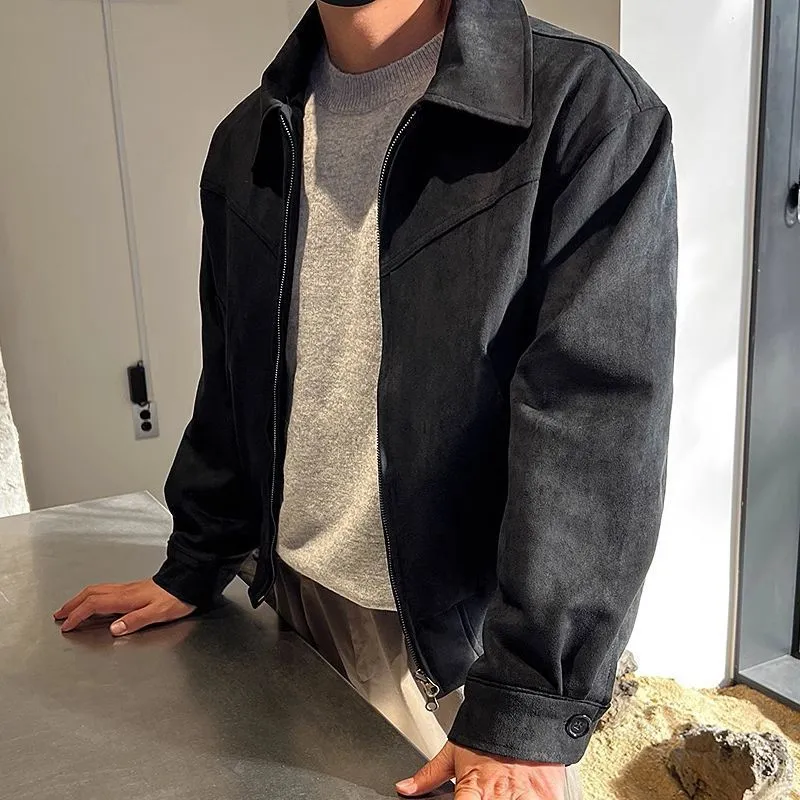 Short jacket with loose lapels in brown suede-style fabric, front view, on a plain background.