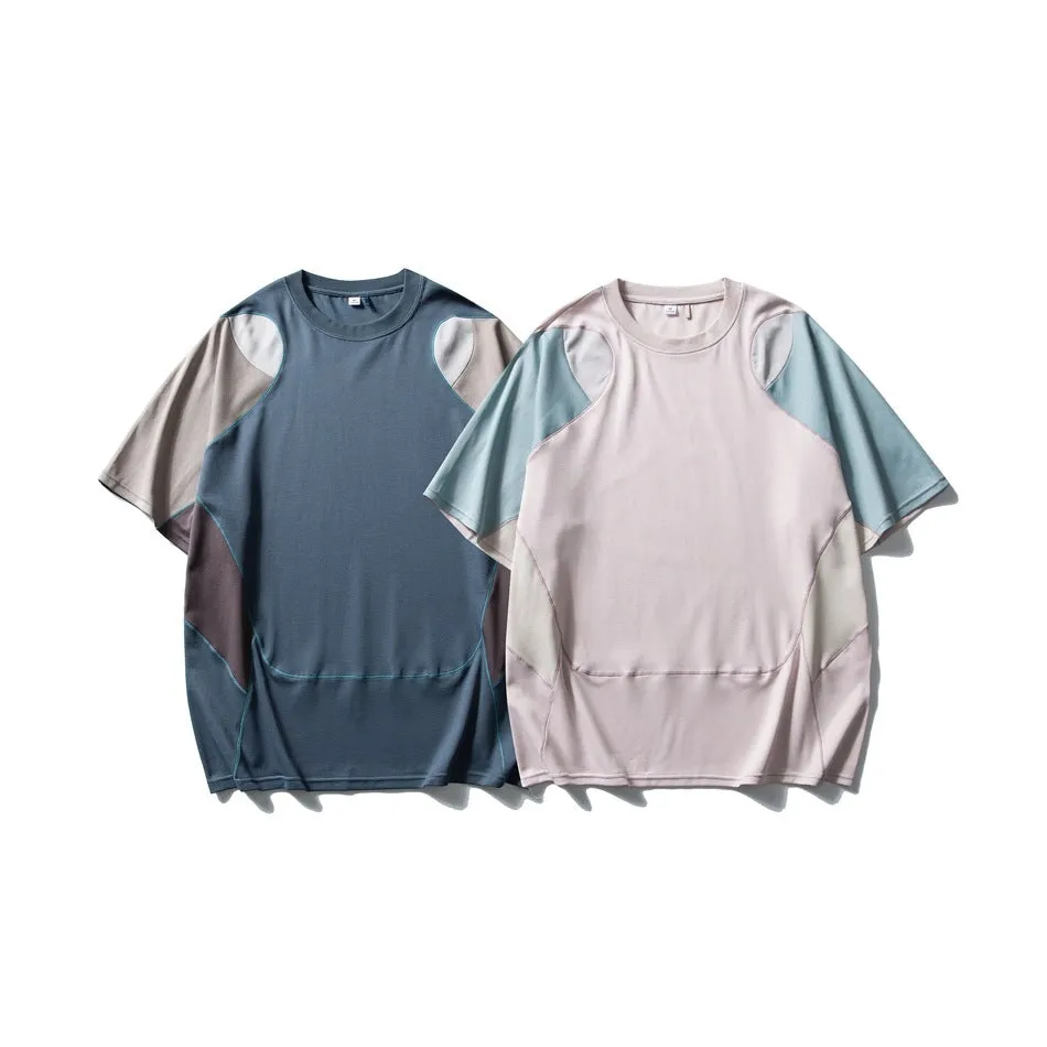 Men's loose blue patchwork contrast short sleeve t-shirt on a hanger