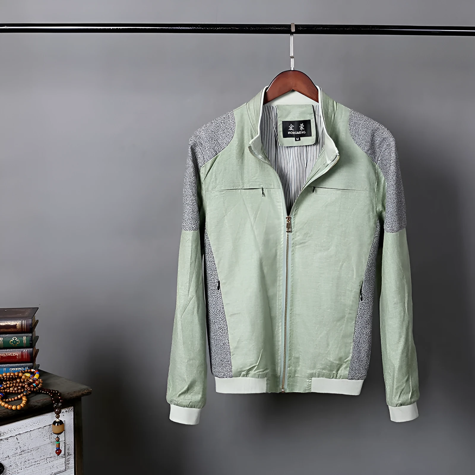 Men's thin cotton linen jacket in blue, displayed on a hanger