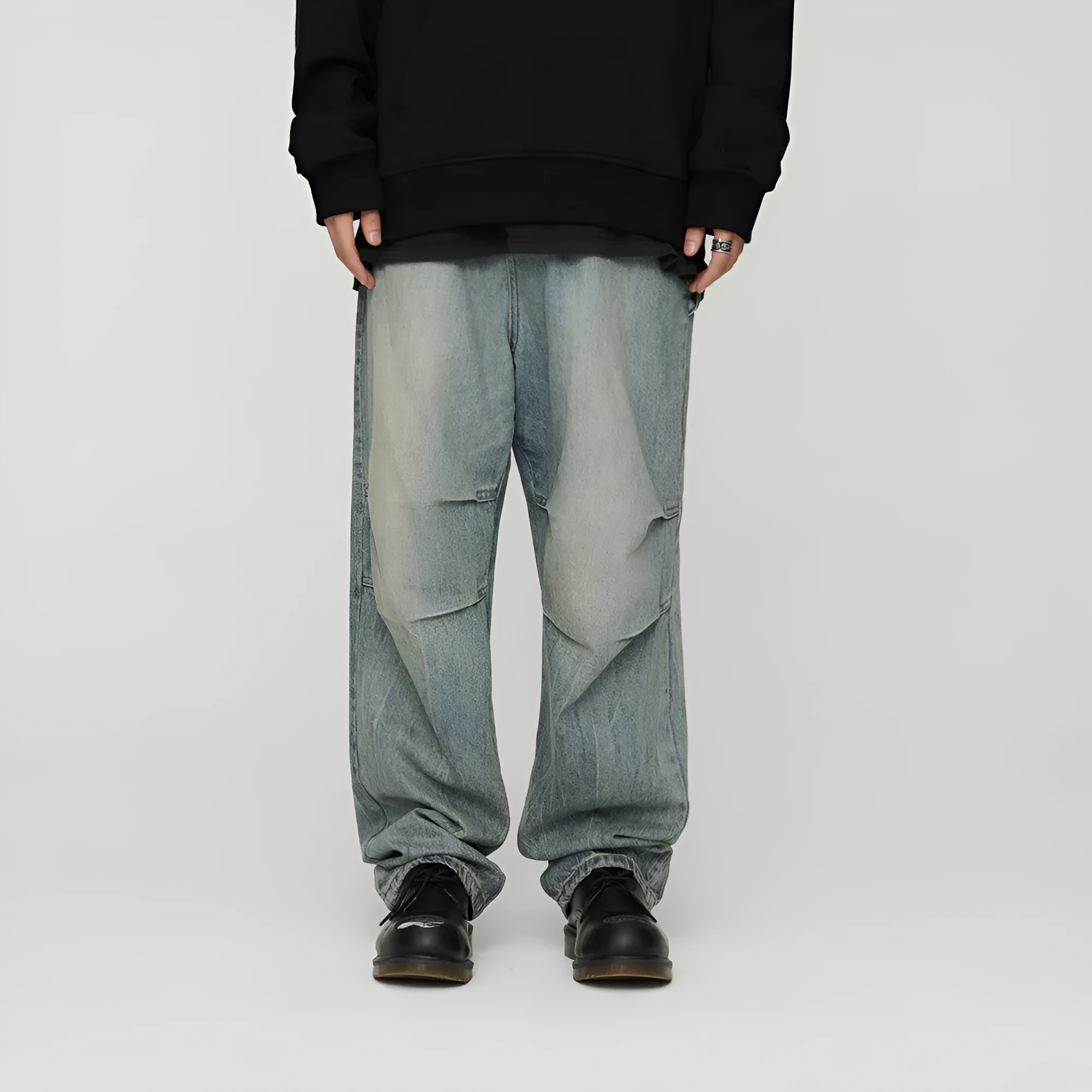 Light wash grey baggy oversized denim jeans with pleats, straight leg, 100% cotton, distressed washed blue