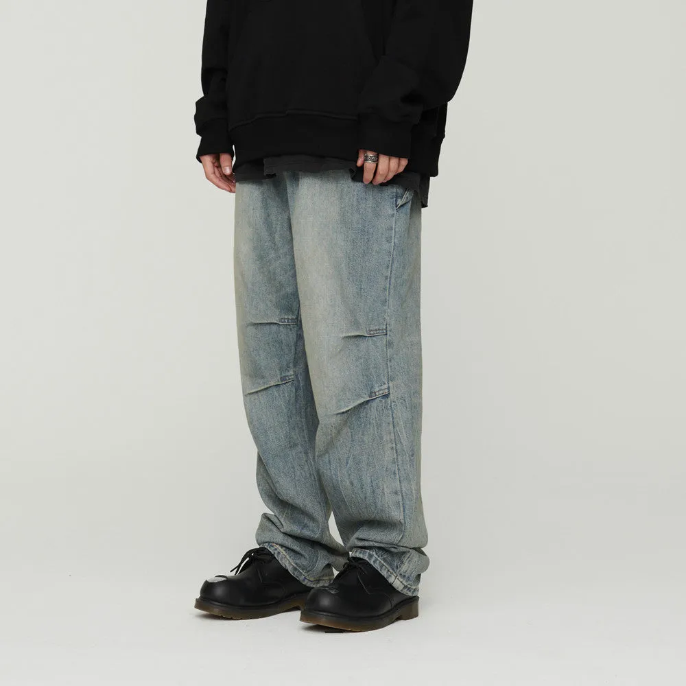 Light wash grey baggy oversized denim jeans with pleats, straight leg, 100% cotton, distressed washed blue