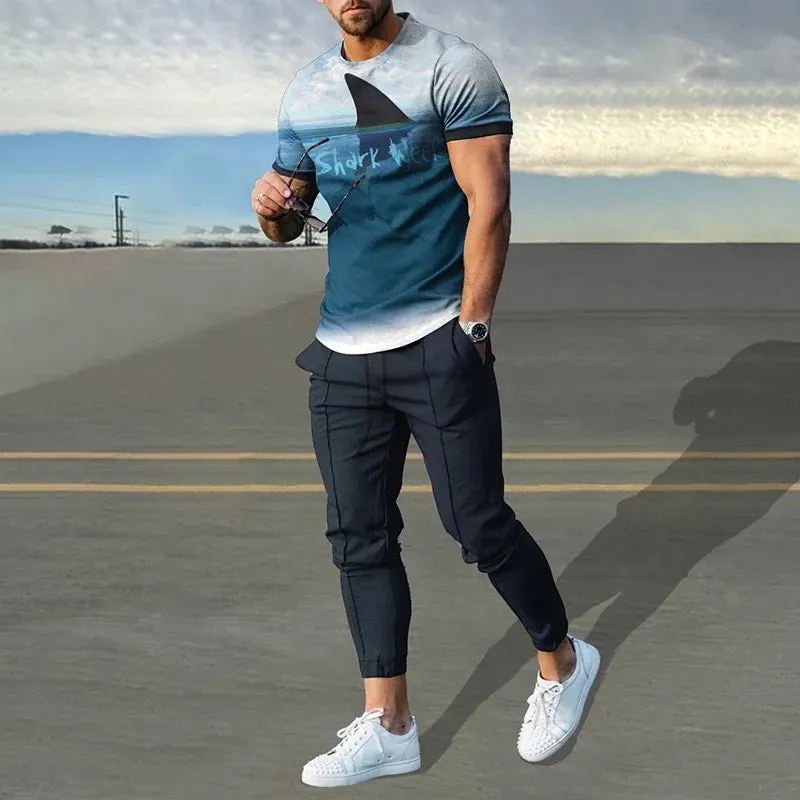 Men's grey polyester blend sport suit set with short sleeve T-shirt and matching trousers on a hanger.