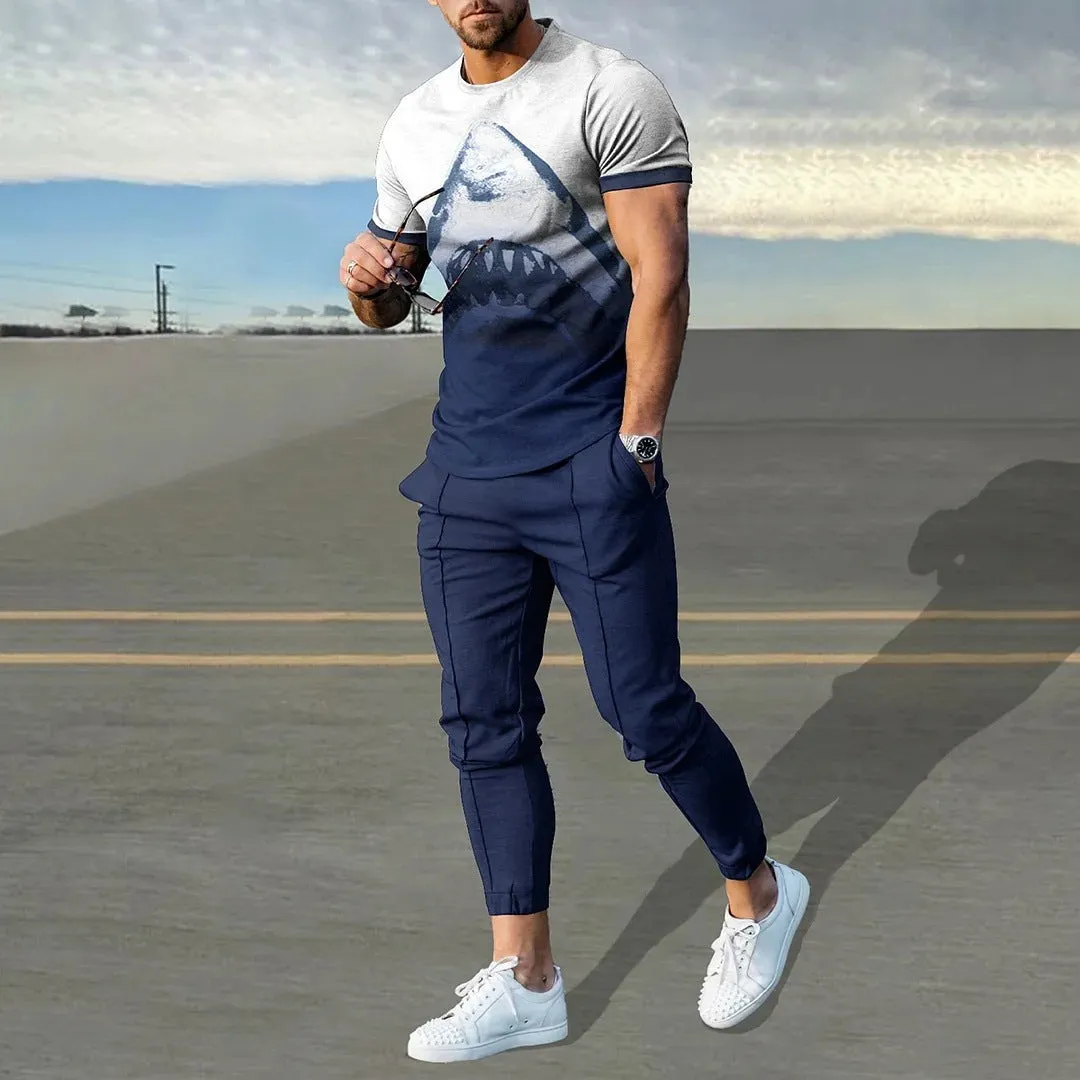 Men's grey polyester blend sport suit set with short sleeve T-shirt and matching trousers on a hanger.