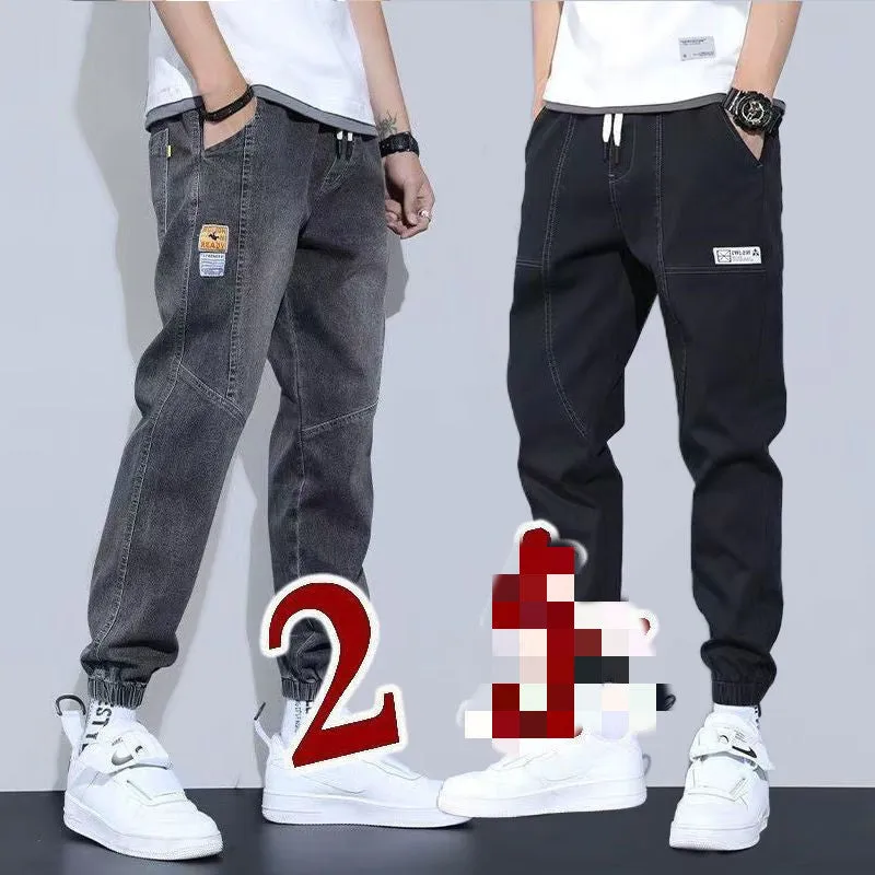 Two pairs of women's casual cotton jeans with mid waist and washed finish in grey and black
