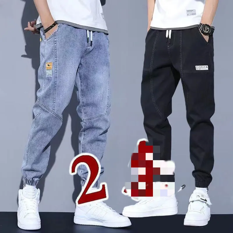 Two pairs of women's casual cotton jeans with mid waist and washed finish in grey and black