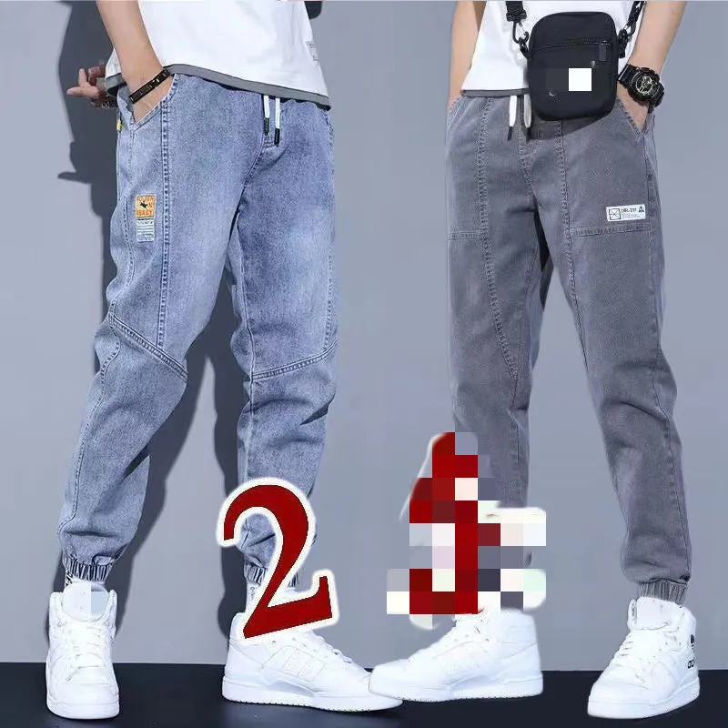 Two pairs of women's casual cotton jeans with mid waist and washed finish in grey and black