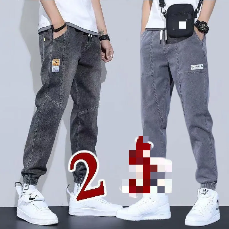 Two pairs of women's casual cotton jeans with mid waist and washed finish in grey and black
