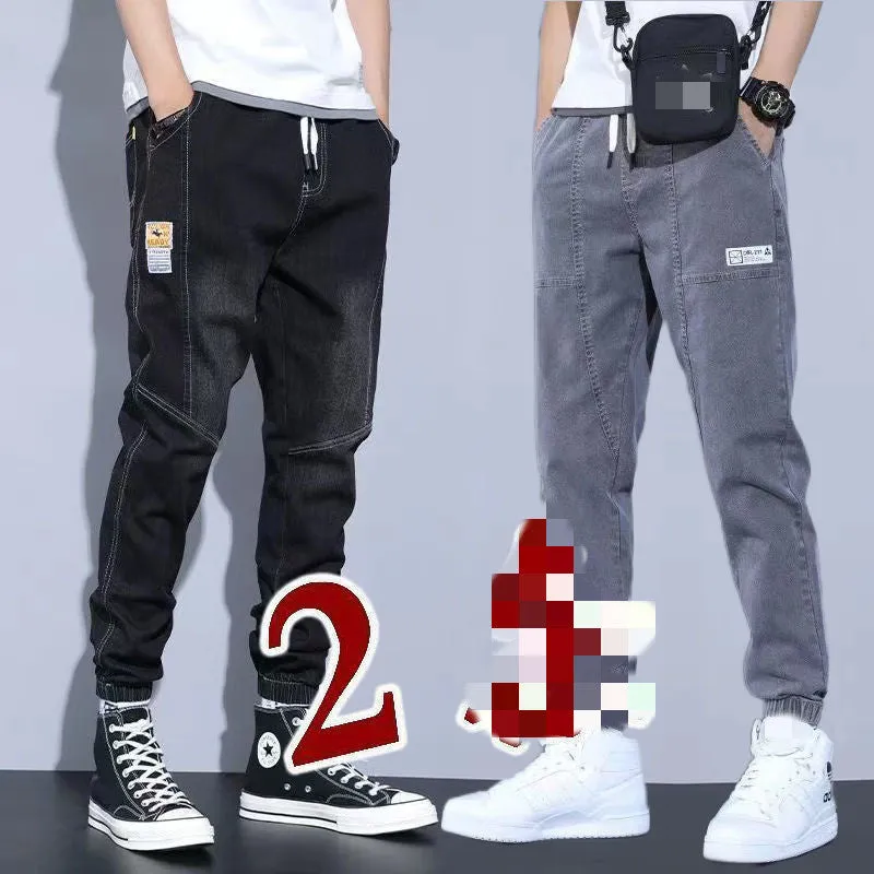Two pairs of women's casual cotton jeans with mid waist and washed finish in grey and black
