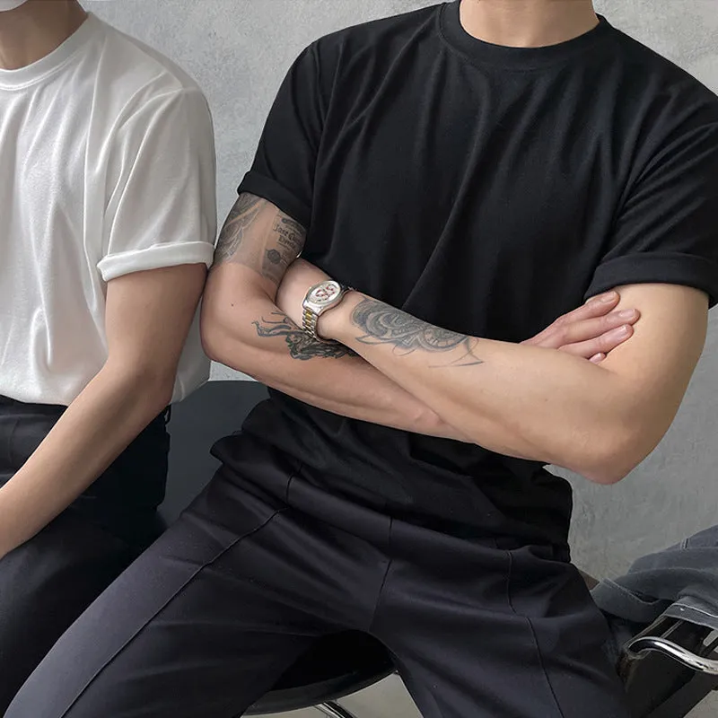 Men's slim fit plain cotton t-shirt in white on a hanger, showing round neck and half sleeve design.
